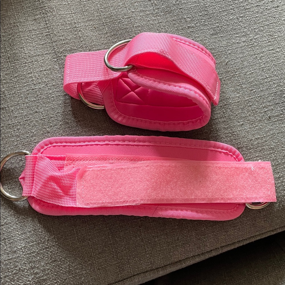 Fitness Ankle Straps for Cable Machines at the Gym. Pink